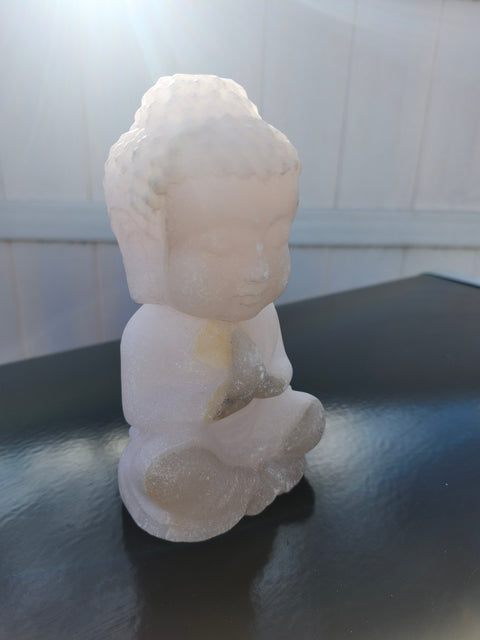 Praying Buddha carving rose quartz