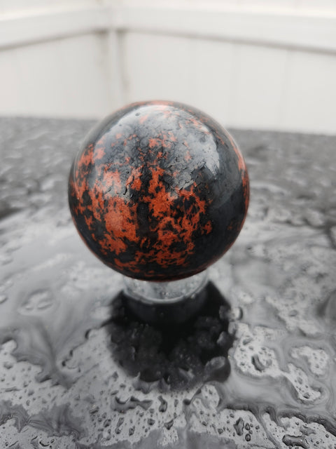 Red obsidian sphere 8 ounces