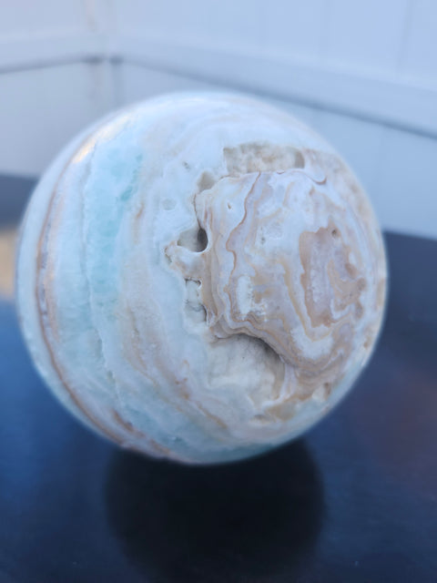 Mega blue,white and orange calcite sphere