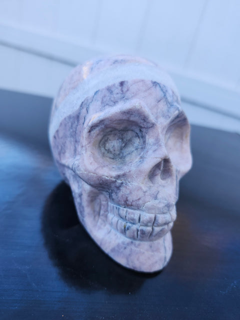 Pink Picasso stone skull