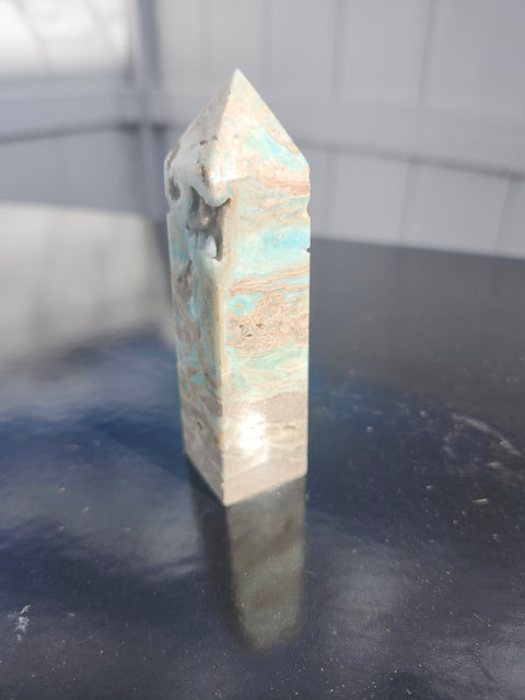 Blue, brown Calcite tower