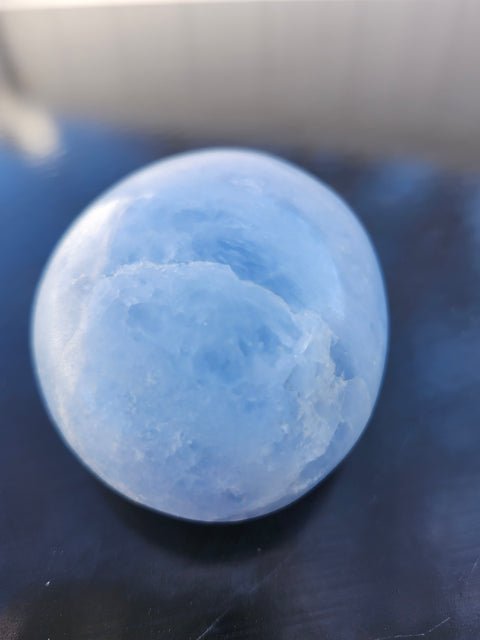 Blue calcite palm stone