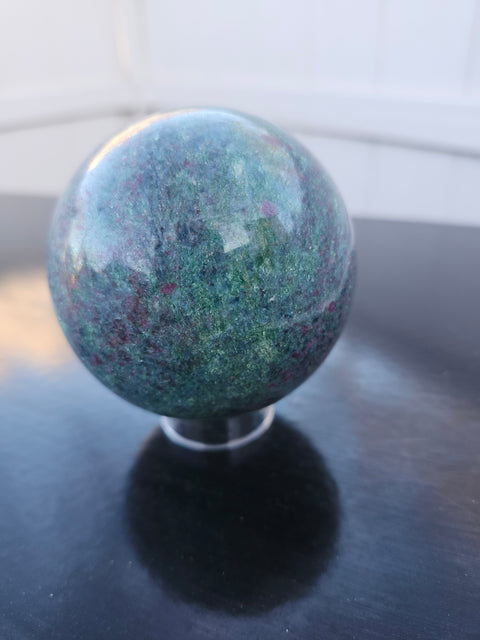 Green,blue,red ruby in kyanite sphere uv reactive