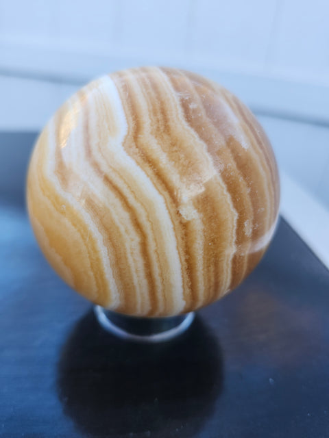 Orange calcite sphere