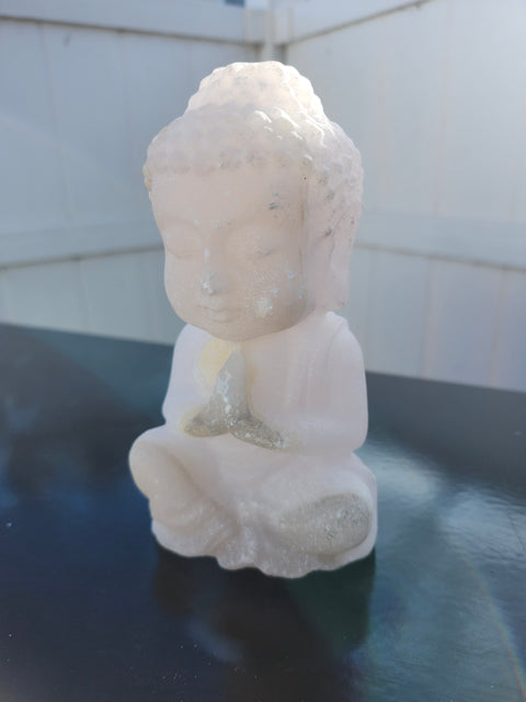 Praying Buddha carving rose quartz