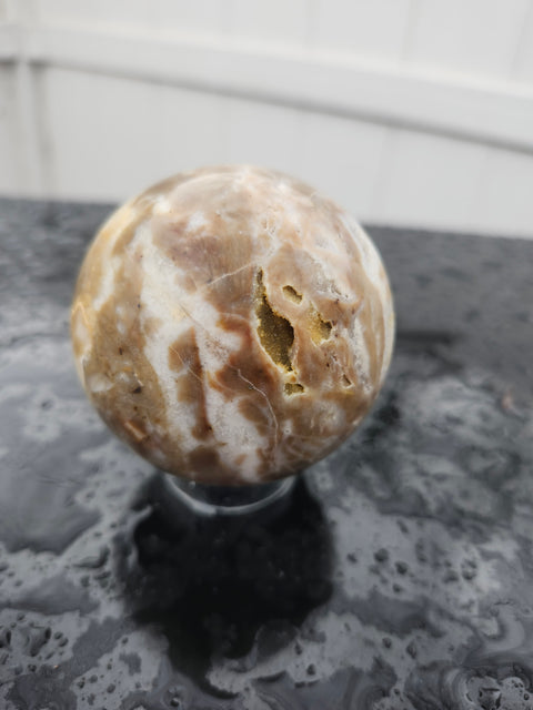 Brown and white sparkling agate sphere 11 ounces