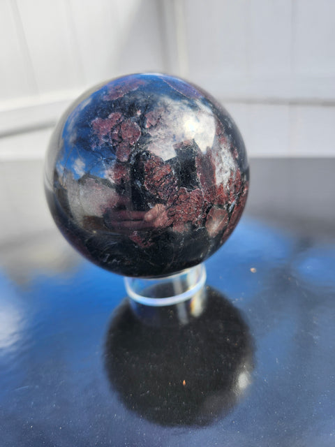 Astrophyllite garnet fireworks sphere