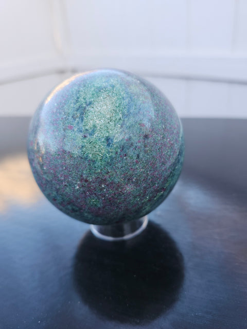 Green,blue,red ruby in kyanite sphere uv reactive