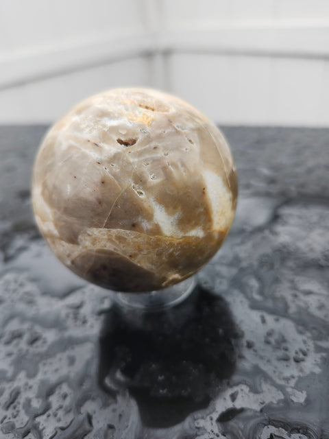 Brown and white sparkling agate sphere 11 ounces