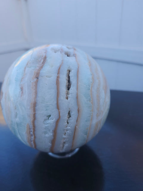 Mega blue,white and orange calcite sphere