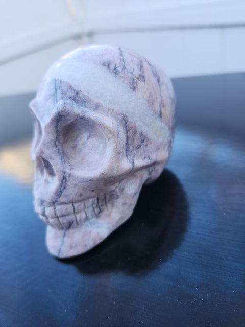 Pink Picasso stone skull