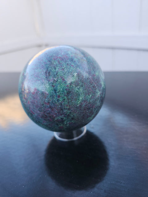 Green,blue,red ruby in kyanite sphere uv reactive