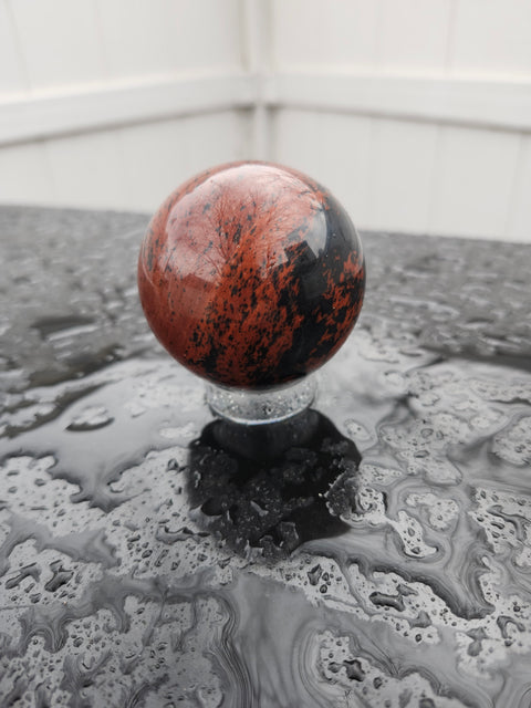 Red obsidian sphere 8 ounces