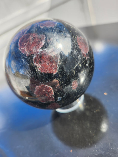 Astrophyllite garnet fireworks sphere