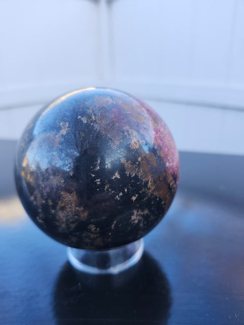 Rhodonite sphere with stand