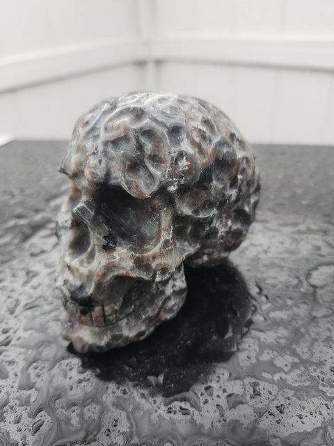 Flame stone skull